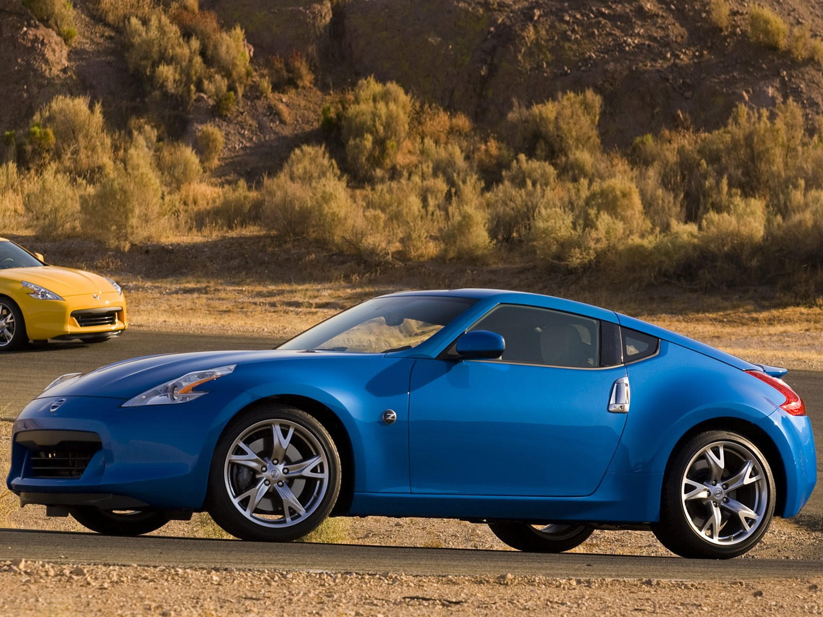 Nissan 370z. 2010 Nissan 370z. Nissan z 2010. Ниссан 370z голубой.