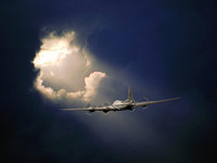 Самолёт летит в просвет между облаками
